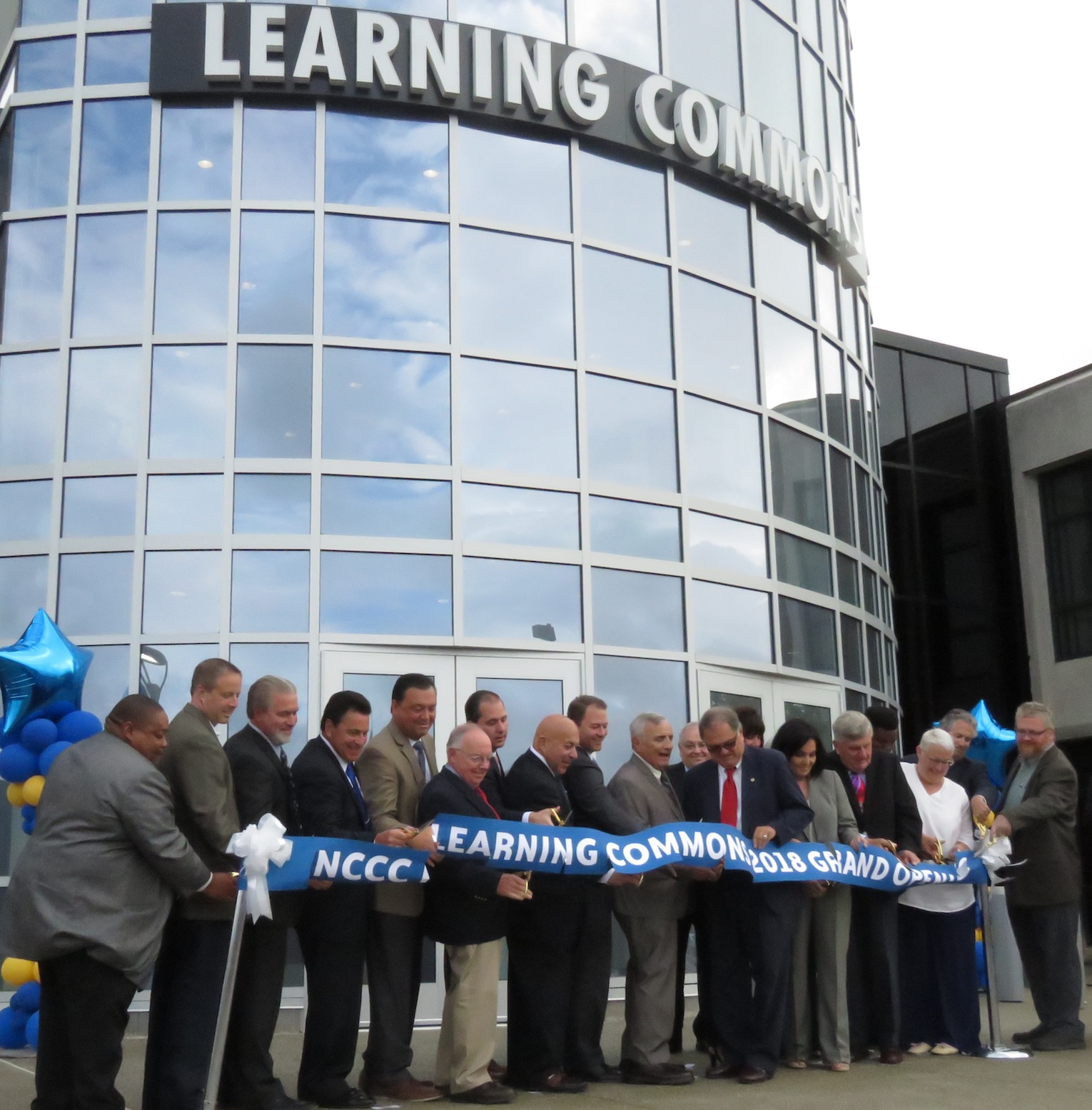 Niagara County Community College trustees, elected officials and more cut the ribbon to the new Learning Commons facility at the Sanborn campus. (Photos by David Yarger)
